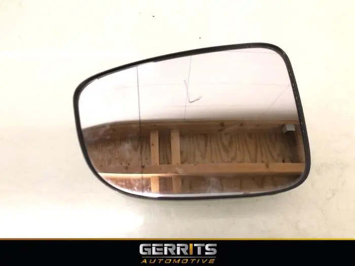 Spiegelglas links Mazda 2.