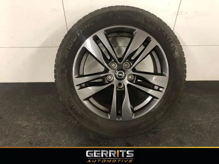 Wheel + winter tyre Opel Astra